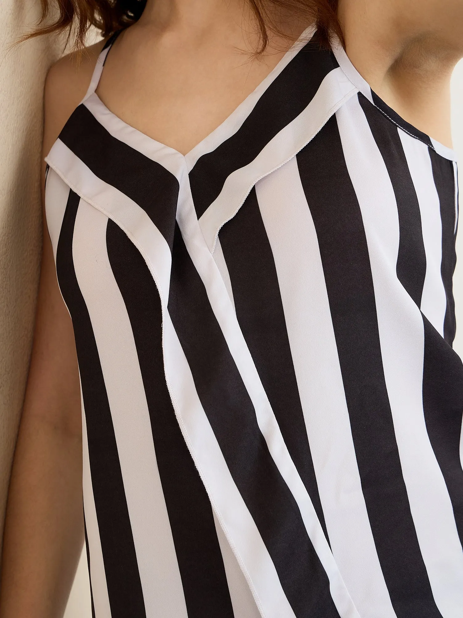 Berrylush Women White & Black Vertical Striped Print V-Neck Sleeveless Ruffled Regular Top